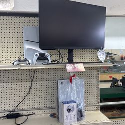 PlayStation 52 controllers and a monitor