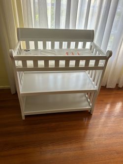 Baby changing table by Delta