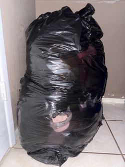 Full black bag of M/L women’s clothes