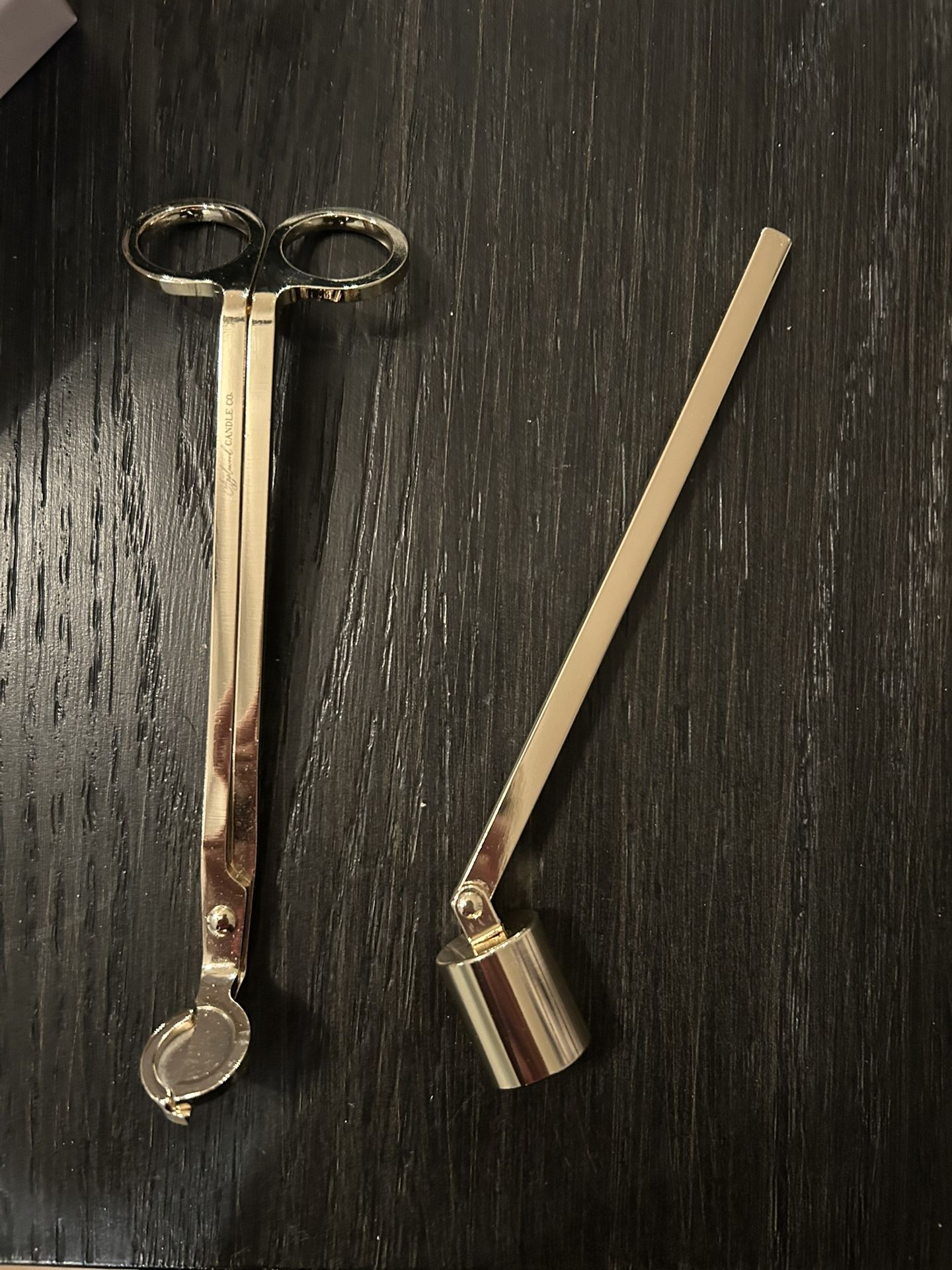 Candle accessories; gold toned wick trimmer and candle snuffer. New but out of package. 