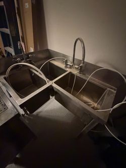 Commercial Stainless Steel 3-Compartment Sink plus hand washing sink.