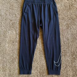 Nike joggers with white swoosh; perfect condition