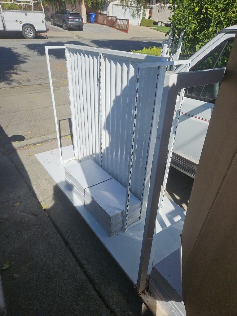 Rolling Metal Shelves With LED Light Strips On Every Shelf