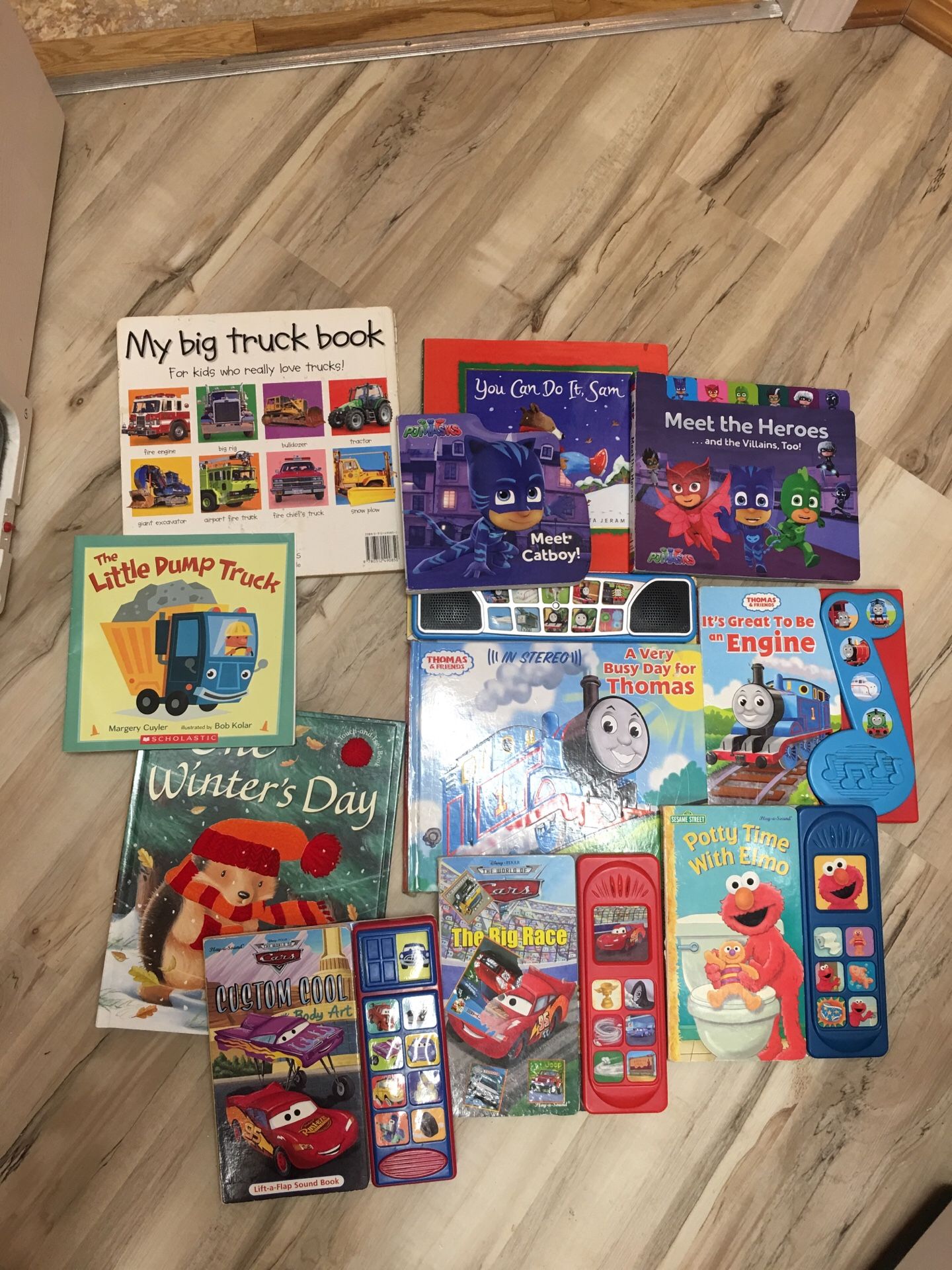 PJ masks Tomas the tank engine truck lightning Elmo goes learns to go potty- talking books