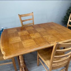 Solid Wood Kitchen Table with 4 Chairs. Chairs are all sturdy.  $250 OBO Pick Only