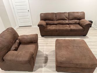 Brown ashley furniture Microfiber Sofa, Chair, and Ottoman Set