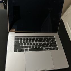 MacBook Pro Laptop (15.6”) W/ Touch Bar