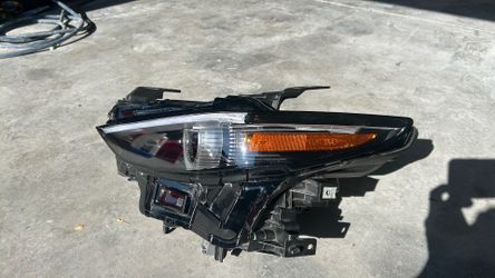 2026 left headlight Mazda 3 hatchback premium plus