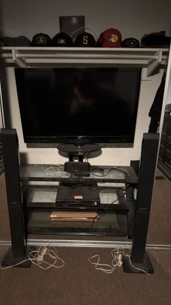 TV with stand and sound system