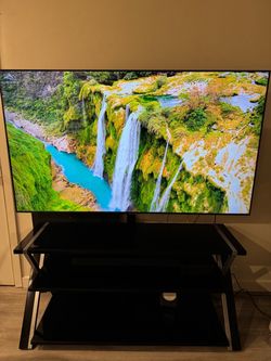 Tv Stand and TV 65”