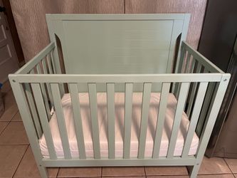 Baby crib with mattress
