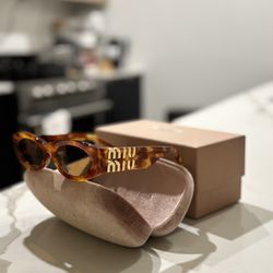 Miu Miu Sunglasses MU A03S