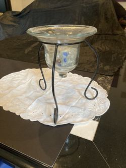 Glass Vase With Marbles On A Metal Stand 