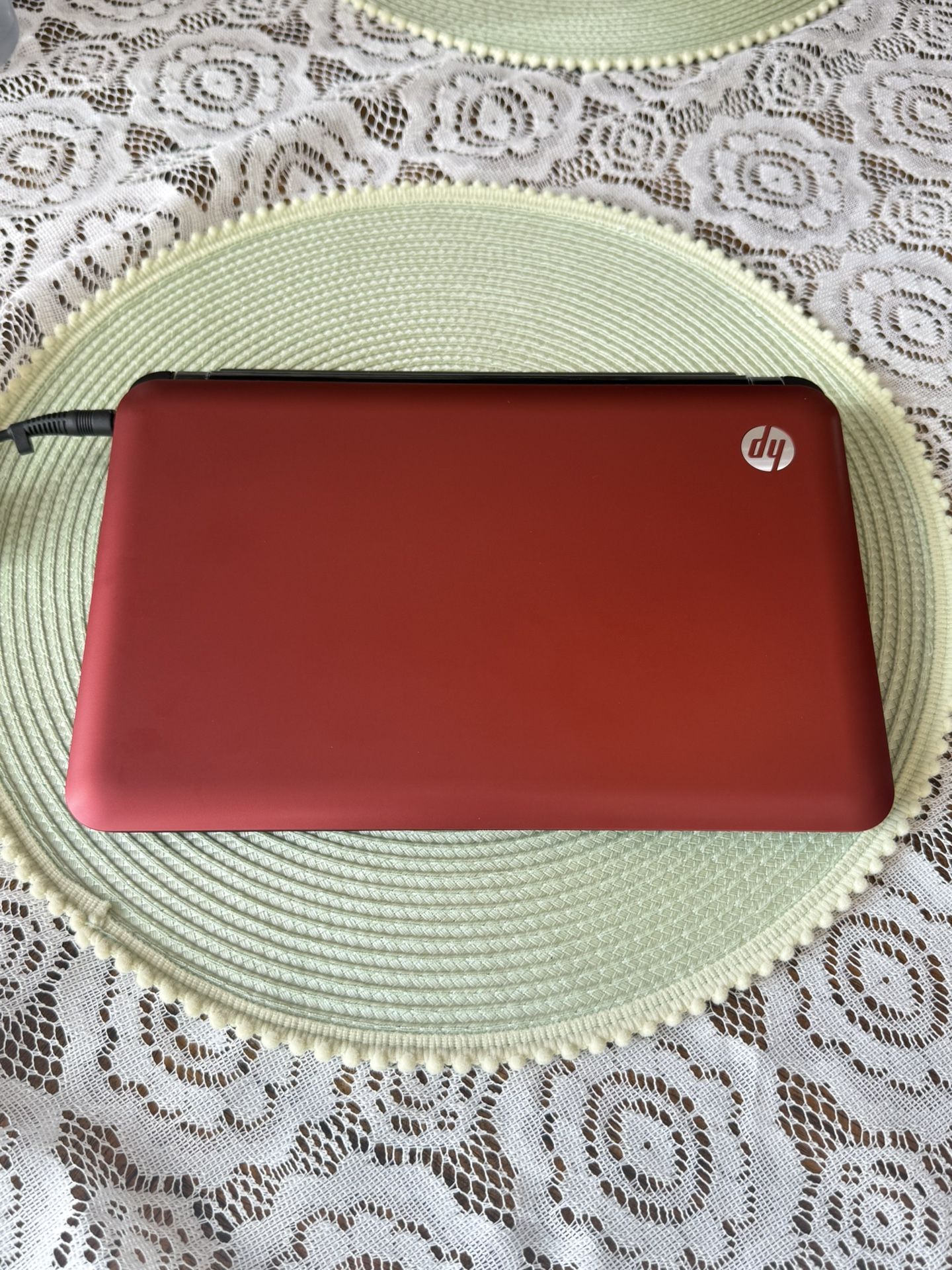 Red HP Mini Laptop
