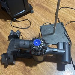 Dyson vaccum with charger