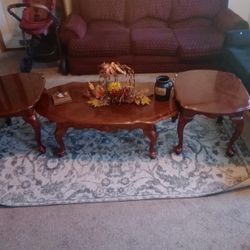 Two End Tables And A Coffee Table 