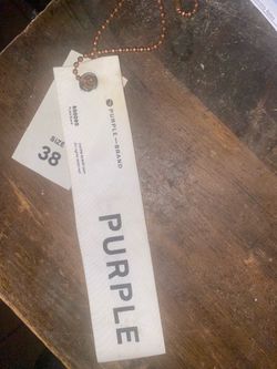 Purple jeans tag