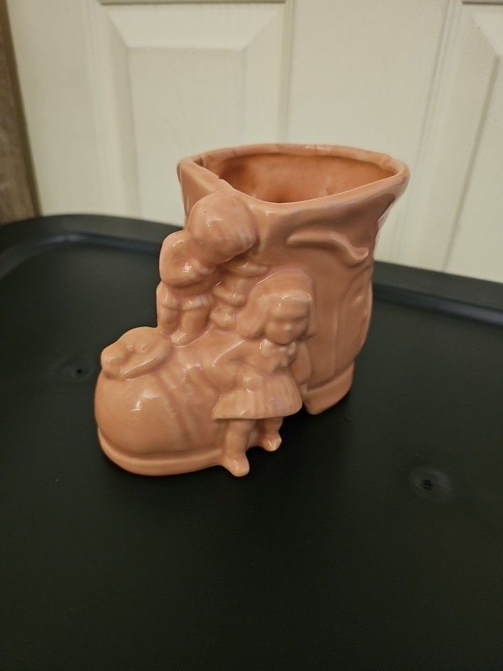 Old Lady In The Shoe Pottery 