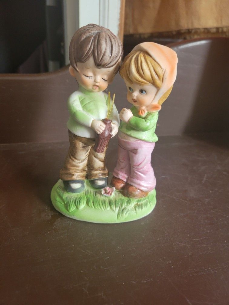 Boy And Girl Sipping Same Cup Figurine