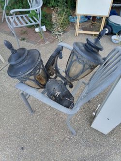 A pair of matching black garage outdoor lights