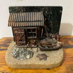 CASITA A TIGUA DE BRONCE