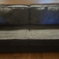 This is actually a dark blue A. Sleeper, couch, the pictures. Don't really show the color it has a nice memory foam mattress w/topper for the sleeper,