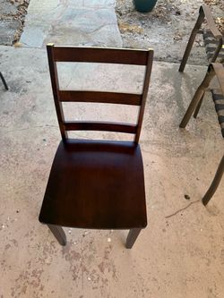 Brown wood dining chairs (8 available)