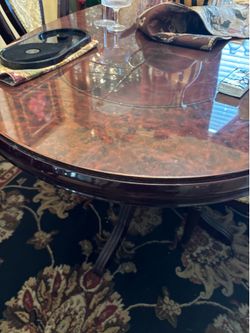 Lg solid wood dining table with 4 chairs & 2 captain chairs extra leaf very heavy ( pick up near Labrea $ Dan Vicente 90019)