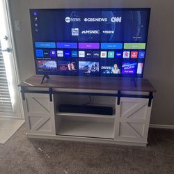 Smart Tv w/ Stand and sound Bar