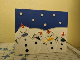 Quilled Christmas greetings cards, and snowflakes ornaments.