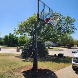 Goaliath 60 inch in ground basketball hoop, adjustable basketball court