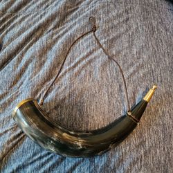 traditional black powder horn made from genuine animal horn with brass