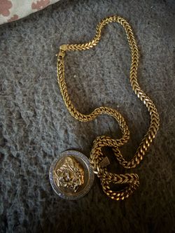 10k Versace pendant and 10k Franco chain nice set,Versace pendant has genuine diamonds