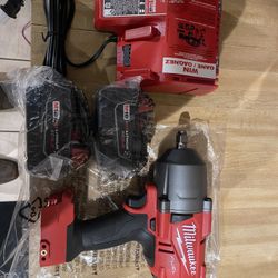 Milwaukee 1/2” Impact Driver With (2) 5 Ah Batteries And Charger 1400 Breakaway Torque New $475 