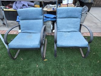 Two blue out chairs