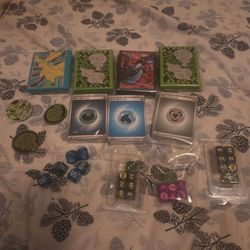 Sleeves, energy cards, game dice and coins