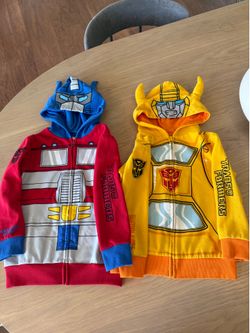 2 Transformers jackets with hoodies like new size 7