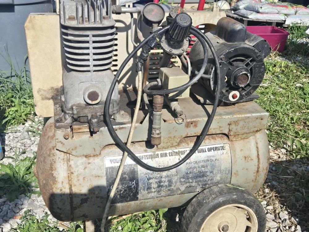 Air compressor with wheels