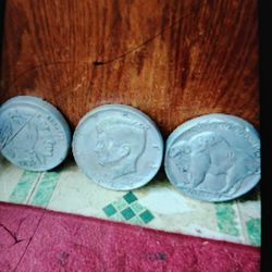 A  Set Of Three Large Buffalo Nickel Wall Mounts 