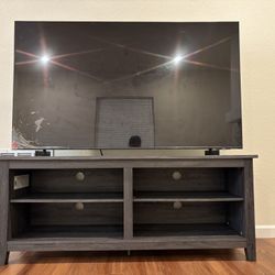 65 inches Samsung TV with table