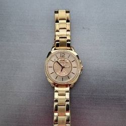 Coach gold and diamond watch paid $495