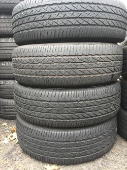 225/65/17 Bridgestone dueler set of used tires in great condition 65% tread 200 $ for 4 . Installation balance and alignment available. Road force