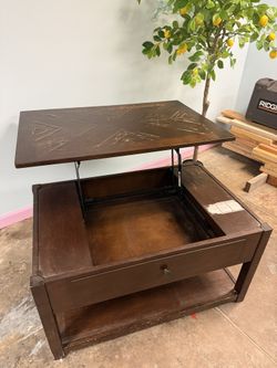 Ashley Furniture Coffee Table with Lift Top and Storage