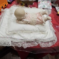 Porcelain Baby Doll With Pillow