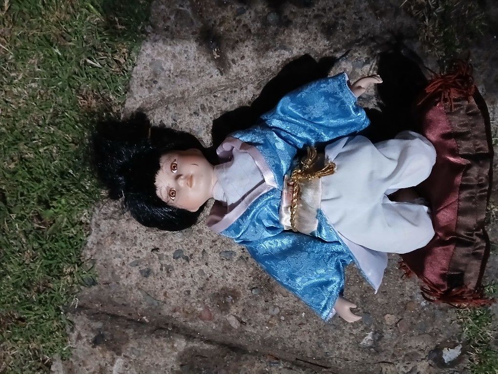 Oriental Porcelain Kneeling Doll in Komono and Obi Holding A Fan