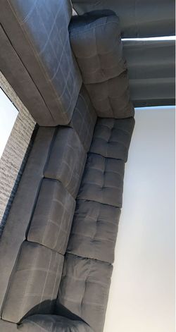 Nice soft used grey suede sectional. it’s in great condition