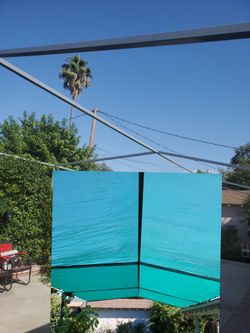 a metal shade with tent