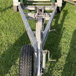 Aluminum Dual Axel Trailer Up To 27’ Boat. . New Lights. Good 15’ Wheels with 6 Lug Hubs. Ready To Load….