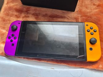 Nintendo Switch with Purple and Orange Joy-Cons