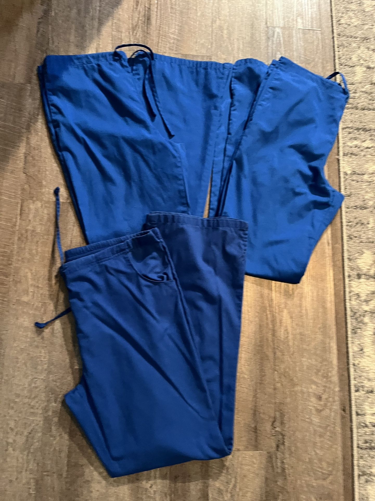3 Pair Royal Blue Scrub Pants. One Size Med Tall. Two Size Sm Tall. All Fit About The Same. All For $15